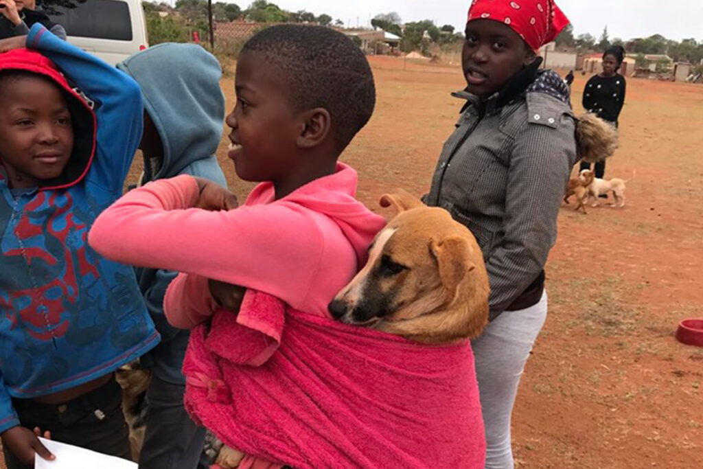 Hoedspruit Animal Outreach pups and children