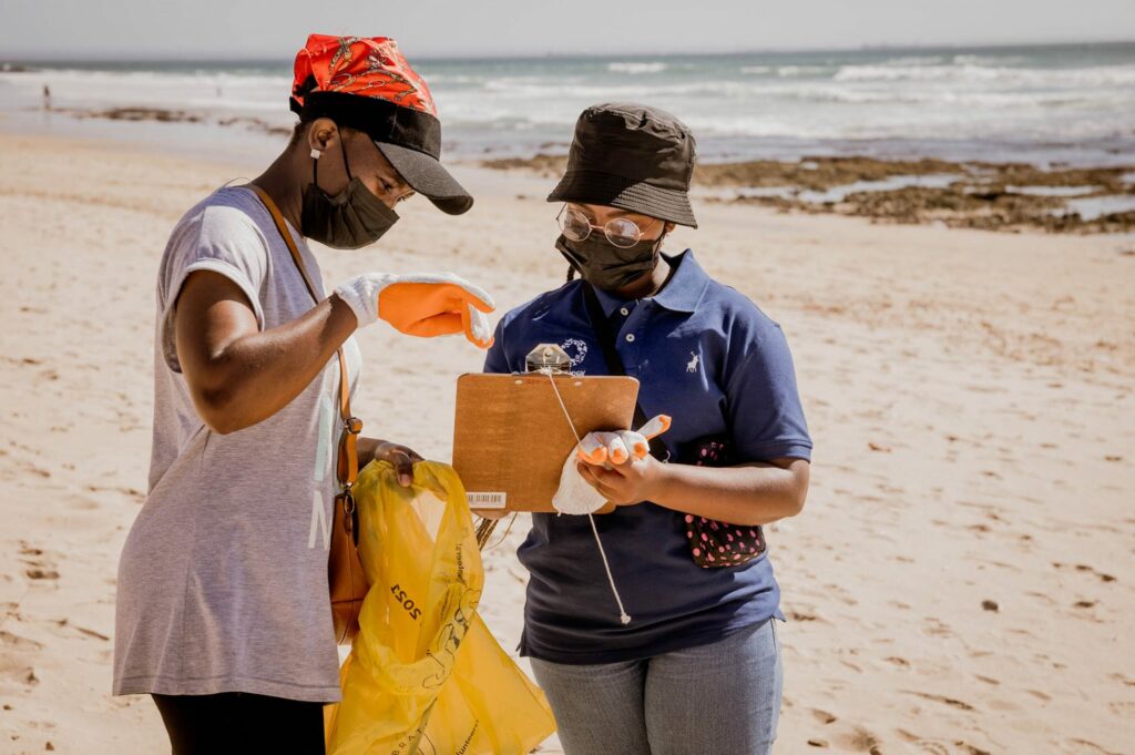 Sustainable Seas Trust volunteers cleaning up beach